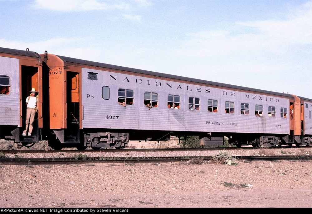 Nationales de Mexico Canadian built (HST) coach #4377 on SBC train.